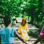 Parents walking with a graduate